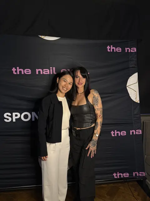 Guests celebrating a day of nail education and community